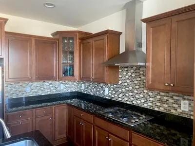 Dated wood kitchen before remodel